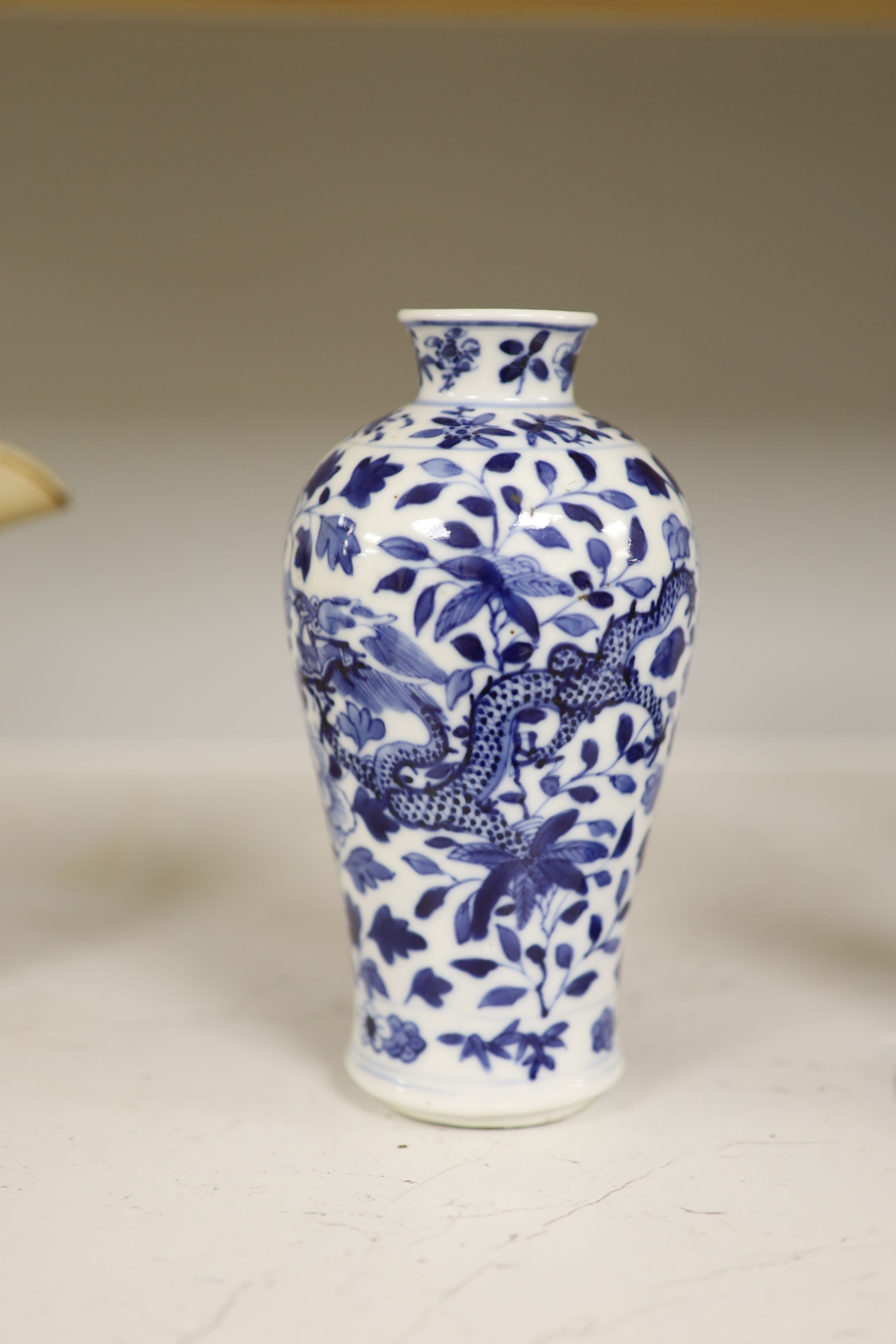 A late 19th century Chinese blue and white dragon vase, height 18cm